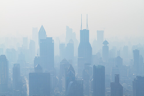Ekspozom - zanieczysczenia i smog widoczny nad miastem